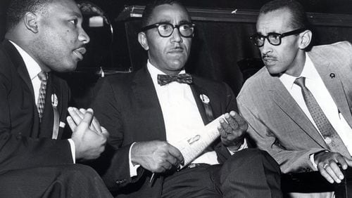 In a Sept. 25, 1963 photo, The Rev. Martin Luther King,Jr., left, Joseph E. Lowery, and Wyatt Tee Walker, right, executive director of the SCLC, meet at First African Baptist Church, for the SCLC convention in Richmond, Va. The Rev. Wyatt Tee Walker, who helped assemble the Rev. Martin Luther King Jr.’s famous “Letter From Birmingham Jail” from notes the incarcerated King wrote on paper scraps and newspaper margins, died Tuesday morning, Jan. 23, 2018, in Chester, Va., said his daughter Patrice Walker Powell. He was either 88 or 89. Family records showed different years of birth, said Powell, who confirmed his death.
