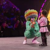 A UniverSoul Circus clown gives a young audience member a thumbs up during an early show for its 30th anniversary year.