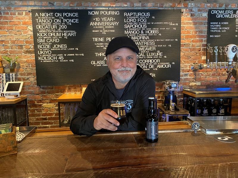 Three Taverns founder Brian Purcell is seen in the brewery's tap room in Decatur. Bob Townsend for The Atlanta Journal-Constitution)