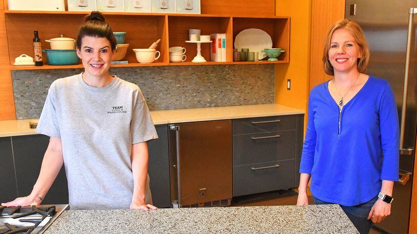 Nealey Thompson (left), Cook’s Warehouse’s cooking school director, and Cook’s Warehouse founder and CEO Mary Moore.