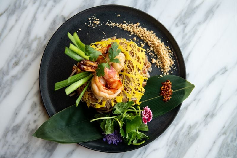 Yao's Jumbo Prawn Pad Thai with stir-fried rice noodles, tamarind sauce, egg, crispy tofu, sweet radish, bean sprouts, chives, and crushed peanuts. (Mia Yakel for The Atlanta Journal-Constitution)