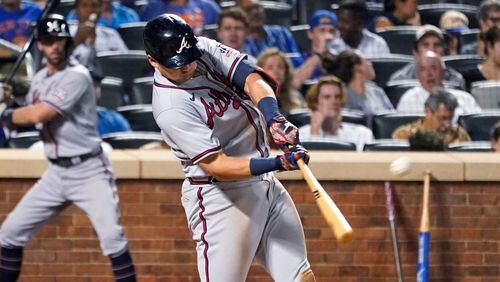Atlanta Braves' Austin Riley hits a two-run home run during the sixth inning of the team's baseball game against the New York Mets, Tuesday, July 27, 2021, in New York. (AP Photo/Mary Altaffer)