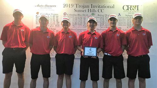 Carter Pendley (holding award) was medalist and Dalton finished second at the Trojan Invitational in Carrollton
