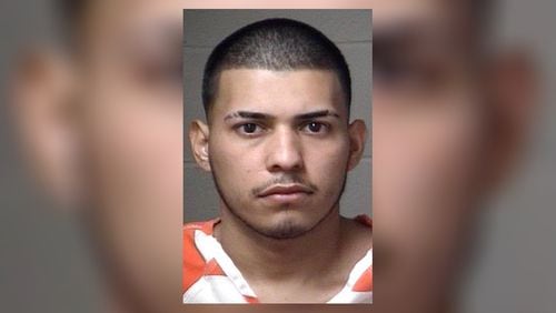 Manuel Dejesus Martinez, 21, was driving a Honda Accord westbound on Ga. 120 when he struck a construction worker, according to the Georgia State Patrol.