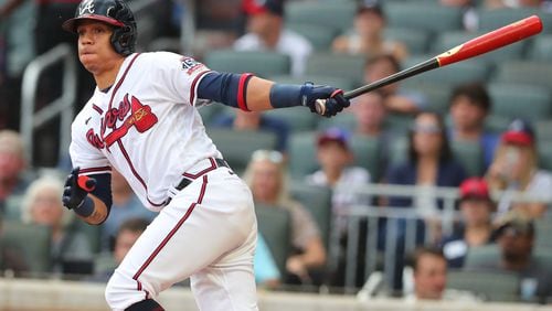 072121 Atlanta: Atlanta Braves Ehire Adrianza hits a RBI double against the San Diego Padres during the second inning in the second game of a double header on Wednesday, July 21, 2021, in Atlanta.   “Curtis Compton / Curtis.Compton@ajc.com”