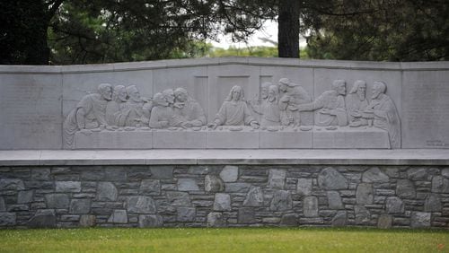 A carving of "The Last Supper" is one of the first details visitors to the Westview Cemetery see. The Atlanta Preservation Center does about ten different walking tours in and around town; Westview Cemetery is their brand new one. Paul Hammock, the education director, shows some details of the tour. KENT D. JOHNSON /KDJOHNSON@AJC.COM