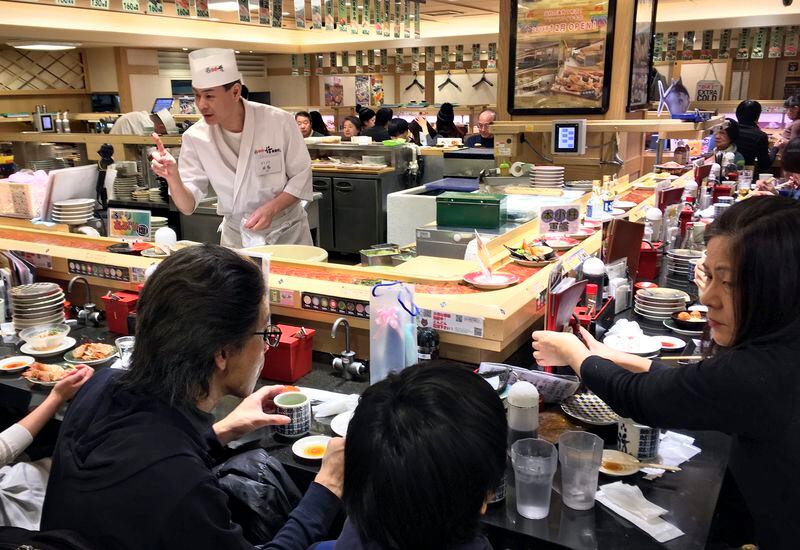 Even with its bustle, Tokyo is a friendly place, filled with people who take time to help strangers. (Amelia Rayno/Minneapolis Star Tribune/TNS)