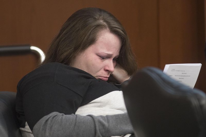 05/13/2019  -- Covington, Georgia -- Cortney Bell becomes emotional while listening to a recording of a phone conversation she had with her co-defendant, Christopher McNabb, during their murder trial in front of Georgia Chief Superior Court Judge John M. Ott at the Newton County Courthouse in Covington, Monday, May 13, 2019. (ALYSSA POINTER/ALYSSA.POINTER@AJC.COM)