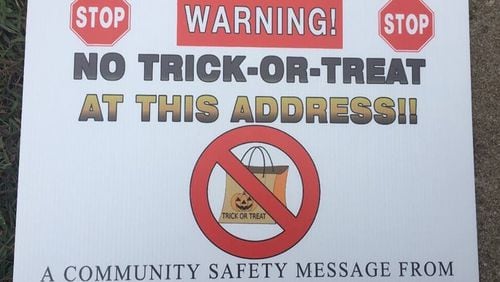Butts County deputies placed this sign at the homes of registered sex offenders ahead of Halloween last year. Three men are suing to stop the Sheriff’s Office from deploying the signs this year.