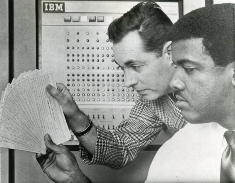 By the 1960s punch cards were the latest word in tech savviness. Gary Carswell, left, and Herman Long check computer punch cards at Georgia State on Nov. 27, 1968.