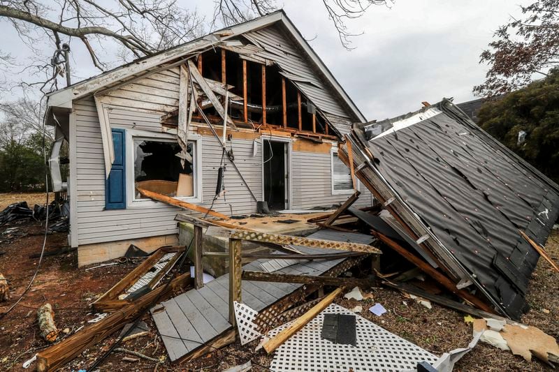  A home was hard hit on McIntosh Road in Griffin, Georgia on Jan. 13, 2023, following violent overnight storms. (John Spink/The Atlanta Journal-Constitution)

