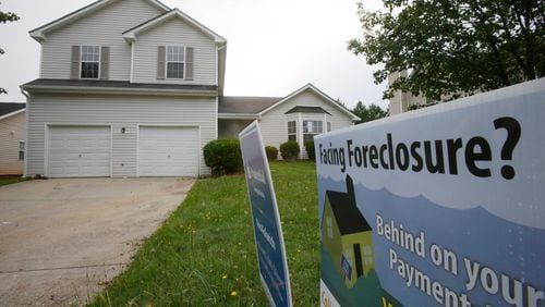 A foreclosed home for sale in DeKalb County. BOB ANDRES / ROBERT.ANDRES@AJC.COM