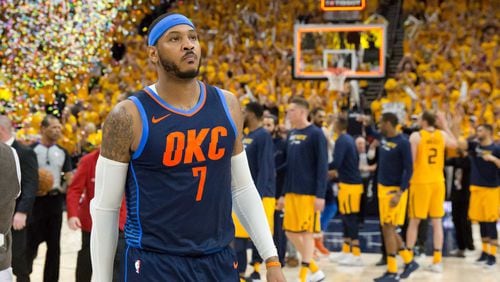 Oklahoma City Thunder forward Carmelo Anthony (7) walks off the court after losing game six of the first round of the 2018 NBA Playoffs against against the Utah Jazz at Vivint Smart Home Arena.