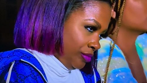 Kandi Burruss, annoyed while listening to Kenya Moore be defensive over her behavior on the trip.  Photo credit: BRAVO