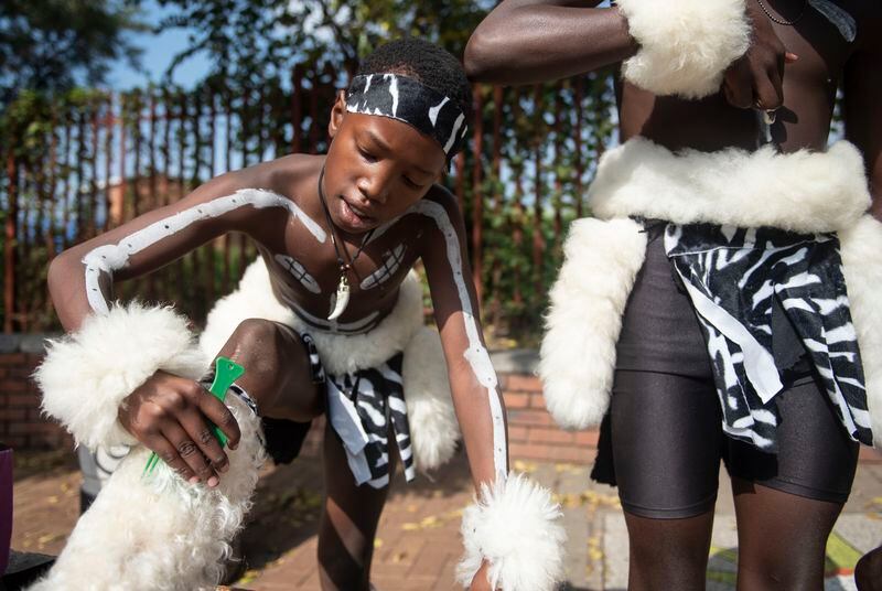 Zulu dancers prepare to perform on Soweto's Vilakazi Street in Soweto, Johannesburg, South Africa, Saturday, April 27, 2024 as the country celebrates Freedom Day. The day marks April 27 when the country held pivotal first democratic election in 1994 that announced the official end of the racial segregation and oppression of apartheid. (AP Photo)
