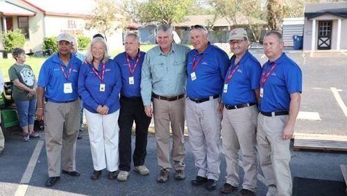 Springboro Police Chief Jeff Kruithoff, third from right, with Franklin Graham, fourth from right, son of the late evangelist Billy Graham. This photo was taken when Kruithoff was part a missionary responding after Hurricane Harvey in Texas. CONTRIBUTED