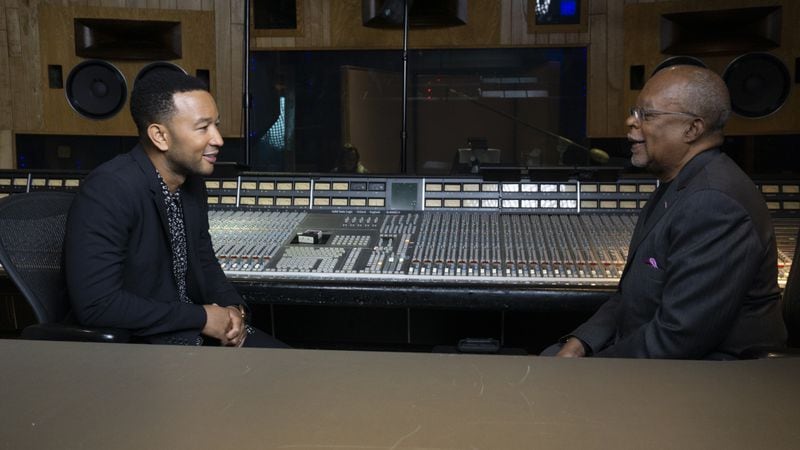 "The Black Church" host Henry Louis Gates Jr. speaks to recording artist John Legend about his experience as a child in church. Courtesy of McGee Media