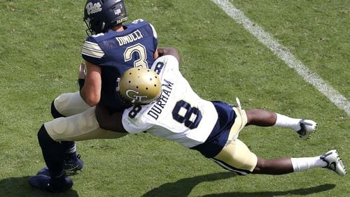Cornerback Step Durham  of the Georgia Tech Yellow Jackets tackles quarterback Ben Dinucci of the Pittsburgh Panthers during the game at Bobby Dodd Stadium on September 23, 2017 in Atlanta, Georgia.  (Photo by Mike Zarrilli/Getty Images)
