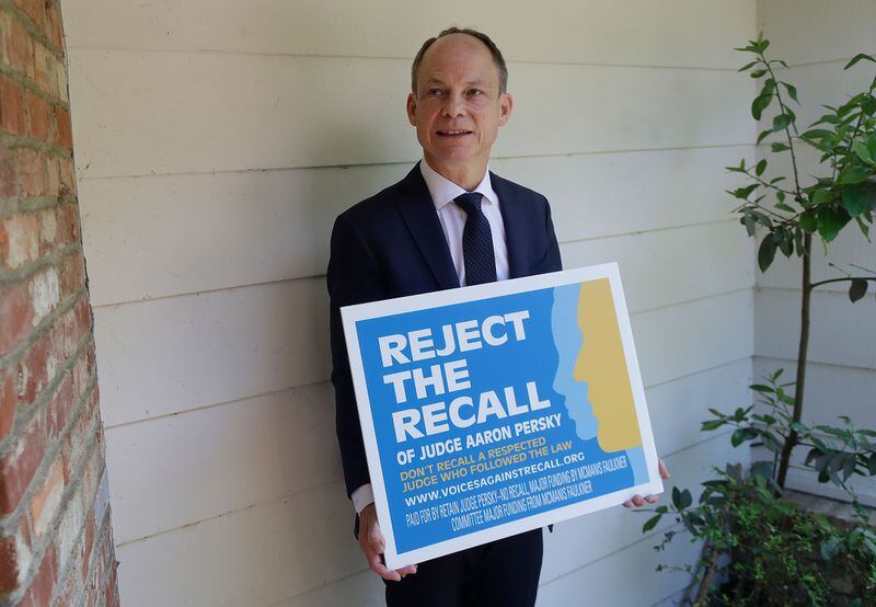 In this May 15, 2018 photo, Judge Aaron Persky poses for photos while being interviewed in Los Altos Hills, Calif. Persky says he would handle the sexual assault case of former Stanford University swimmer Brock Turner the same way today as he did almost exactly two years ago, even though it's the reason why he is the target of a June 5 recall election in Santa Clara County. Persky sentenced Turner to six months in jail.