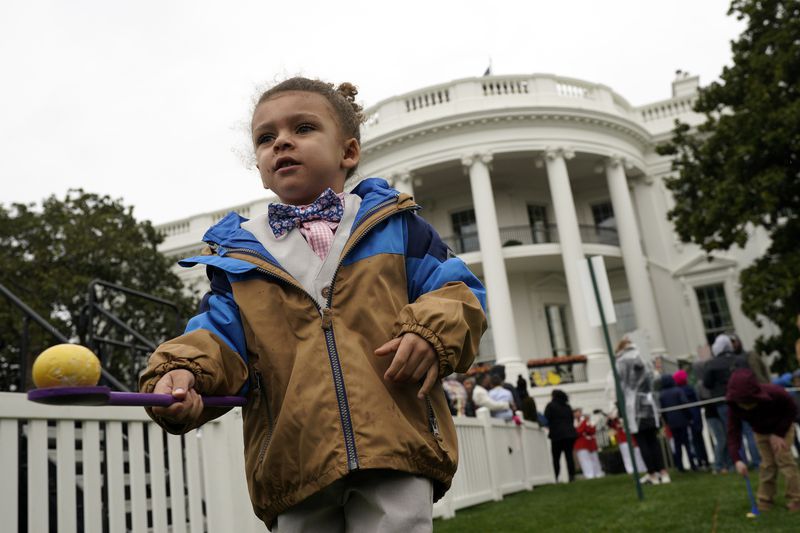 Children participate in the Easter Egg Roll on the South Lawn of the White House in Washington D.C., on April 18, 2022.