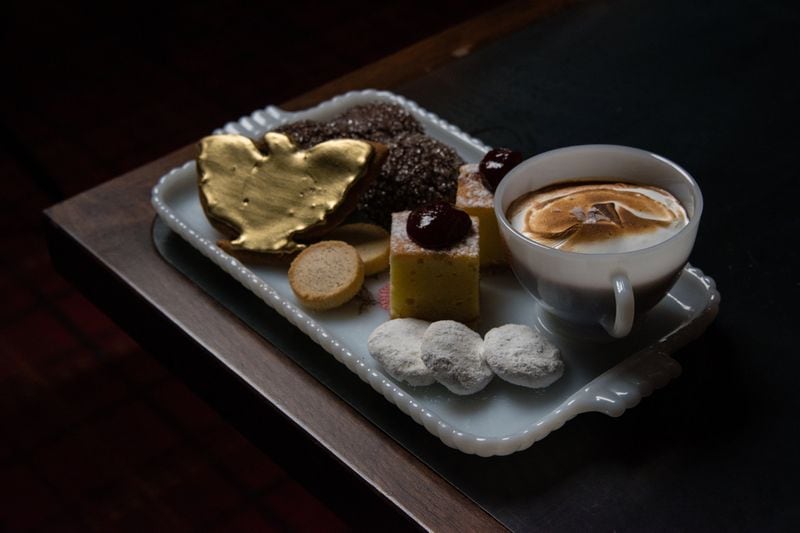 A selection of cookies for dessert at Golden Eagle, including (clockwise from left): Golden Eagle Gingerbread, chocolate sugar cookies, Mont Rouge, sipping chocolate topped with meringue, wedding cookies and rye sable. CONTRIBUTED BY HENRI HOLLIS