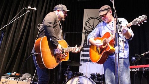 Kristian Bush and Andrew Hyra - reunited at their old stomping grounds at Eddie's Attic. Photo: Melissa Ruggieri/AJC