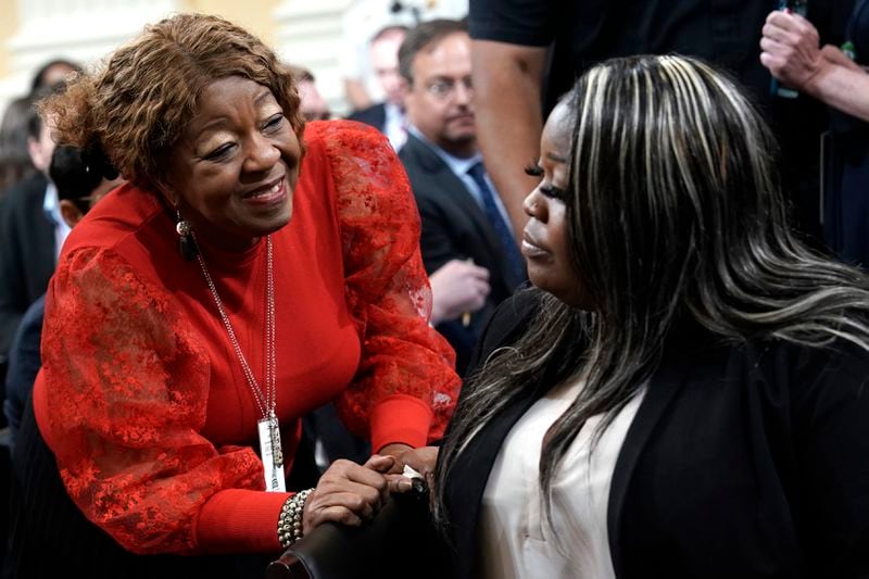 Former Fulton County, Georgia, election worker Ruby Freeman, left, talks to her daughter Wandrea"Shaye" Moss, former Georgia election worker, after Moss testified before U.S. House Select Committee at its fourth hearing on its Jan. 6 investigation on Capitol Hill in Washington, D.C., on Tuesday, June 21, 2022. (Yuri Gripas/Abaca Press/TNS)