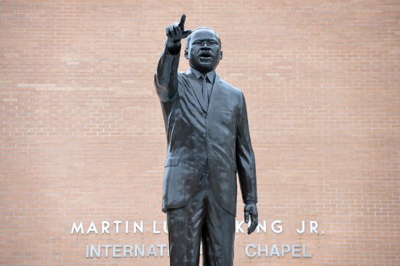 The statue of Dr. King on the Morehouse College campus by Denver sculptor Ed Dwight. (HYOSUB SHIN / HSHIN@AJC.COM)
