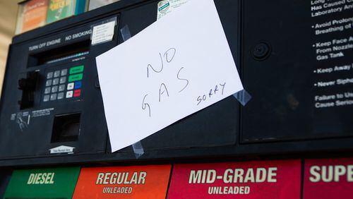 Notes are taped to empty gas pumps at Chevron gas station on Canton Road in Marietta on Thursday. Motorists throughout Metro Atlanta still struggled to find gas due to the shut down of the Colonial Pipeline distribution network last Friday after a cyberattack. CHRISTINA MATACOTTA FOR THE ATLANTA JOURNAL-CONSTITUTION