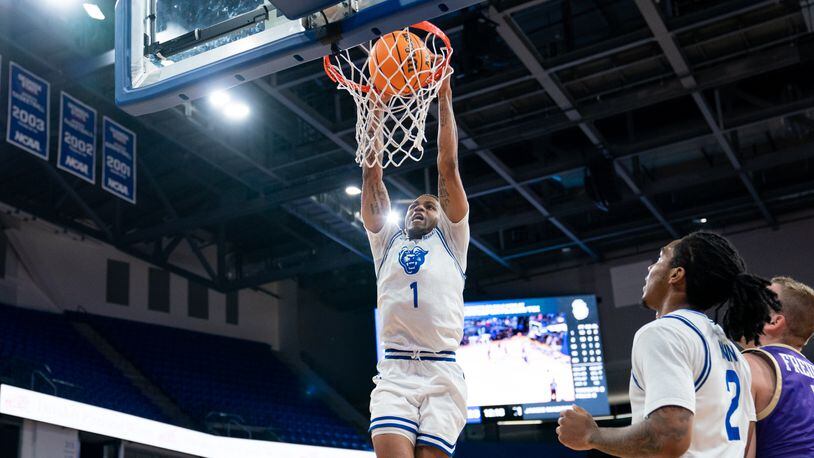 Georgia State's Dwon Odom scores on a slam against James Madison. Odom scored 17 in GSU's 63-47 loss to open Sun Belt Conference competition on Dec. 29, 2022.