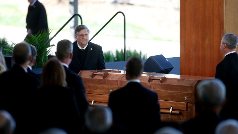A casket carrying the body of Rev. Billy Graham sits in front of the stage during his funeral service at the Billy Graham Library on March 2, 2018 in Charlotte, North Carolina.  A spiritual counselor for every president from Harry Truman to Barack Obama and other world leaders for more than 60 years, Graham died February 21 at the age of 99. (Photo by Brian Blanco/Getty Images)