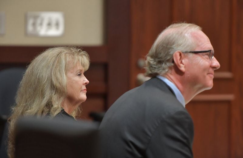 Hoschton Mayor Theresa Kenerly sits with her attorney Tony Powell during a hearing before Judge David Sweat at Jackson County Magistrate Court on Wednesday, Oct. 2, 2019. Kenerly and Councilman James Cleveland contested a recall effort aimed at removing them from office. They have been under fire since an AJC investigation revealed a candidate for city administrator was sidelined because of his race. Judge David Sweat ruled the recalls can proceed. HYOSUB SHIN / HYOSUB.SHIN@AJC.COM