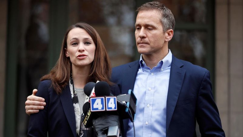 FILE - In this Dec. 6, 2016, file photo, Missouri Gov.-elect Eric Greitens and his wife Sheena speak to the media in St. Louis after she had been robbed at gunpoint the day before. Responding to a news report that overshadowed his annual State of the State address Wednesday night, Jan. 10, 2018, the Republican governor acknowledged he's been "unfaithful" in his marriage but denied allegations that he blackmailed the woman to stay quiet. The couple released a statement late Wednesday after the report that he had a sexual relationship with his former hairdresser in 2015. (AP Photo/Jeff Roberson, File)