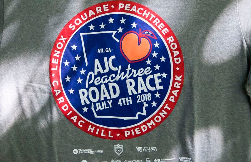 07/03/2018 -- Atlanta, GA - The official 2018 Peachtree Road Race t-shirt is revealed at the Park Tavern, Tuesday, July 3, 2018. ALYSSA POINTER/ALYSSA.POINTER@AJC.COM