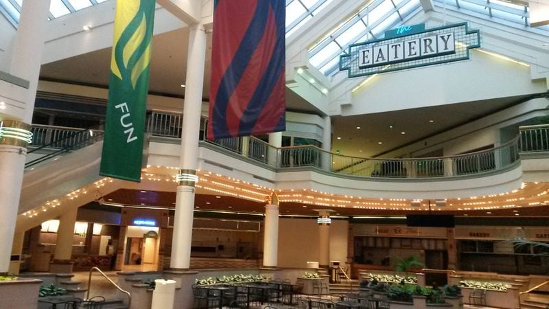 Gwinnett Place mall has struggled in recent years, losing much of its base of retailers and shoppers. In the days before Christmas 2017, the body of a dead woman was found in a vendor space at the mall’s food court. No businesses were operating in the food court on a recent visit. MATT KEMPNER / AJC