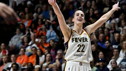 Indiana Fever guard Caitlin Clark (22) reacts after missing a 3-point shot against the Connecticut Sun during the fourth quarter of a WNBA basketball game, Tuesday, May 14, 2024, in Uncasville, Conn. (AP Photo/Jessica Hill)