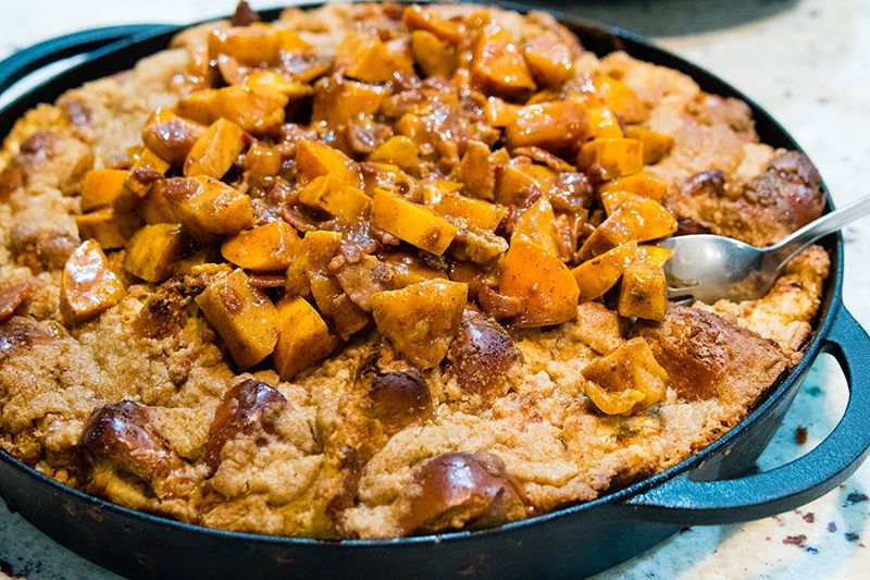 French toast casserole with bacon-persimmon compote, prepared at the Big Green Egg culinary center. CONTRIBUTED BY HENRI HOLLIS