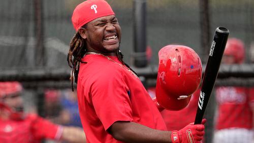 Philadelphia Phillies' Maikel Franco laughs during batting practice at baseball spring training camp, Tuesday, Feb. 20, 2018, in Clearwater, Fla. (AP Photo/Lynne Sladky)