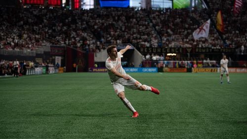 Julian Gressel clears a ball Wednesday, July 17,  2019, against Houston at Mercedes-Benz Stadium in Atlanta.