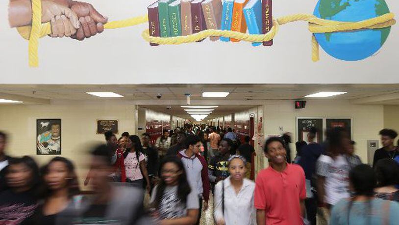 Students flood the halls at dismissal time at McNair High School in DeKalb County on Tuesday, May 3, 2016. Ben Gray / bgray@ajc.com