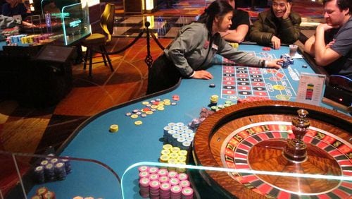 A dealer conducts a game of roulette at the Tropicana casino in Atlantic City, N.J. (AP Photo/Wayne Parry)