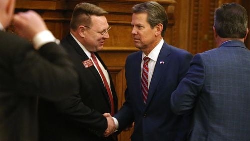 Gov. Brian Kemp shakes hands with Rep. Josh Bonner at the Georgia State Capitol in Atlanta on Tuesday, April 2, 2019. On Friday, March 4, 2022, Bonner urged the House to approve a Kemp-backed parental bill of rights requiring classroom disclosure. (Emily Haney / AJC file photo)