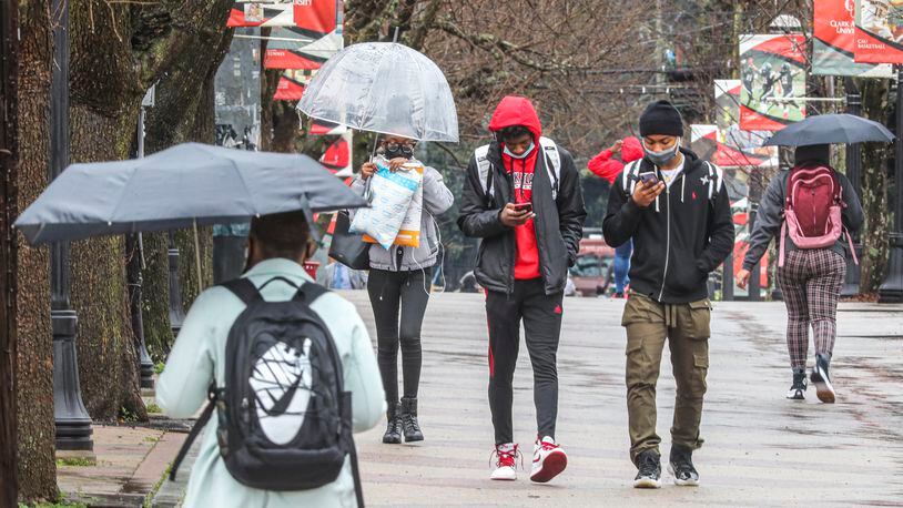 Students walked across the Clark Atlanta University campus on Feb. 23, 2022. Clark Atlanta and Morehouse College are partnering to provide degrees and certificates for minorities aspiring to become principals. (John Spink / John.Spink@ajc.com)