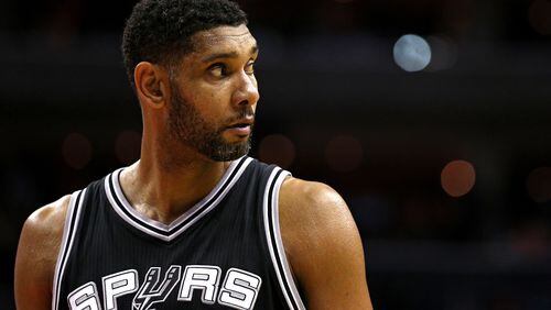 FILE - JULY 11, 2016: It was reported that Tim Duncan of the San Antonio Spurs is retiring from the NBA after 19 seasons July 11, 2016. WASHINGTON, DC - NOVEMBER 04: Tim Duncan #21 of the San Antonio Spurs looks on against the Washington Wizards during the second half at Verizon Center on November 4, 2015 in Washington, DC. The Washington Wizards won, 102-99. NOTE TO USER: User expressly acknowledges and agrees that, by downloading and or using this photograph, User is consenting to the terms and conditions of the Getty Images License Agreement. (Photo by Patrick Smith/Getty Images)