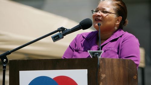 100807 Atlanta -- Dr. Alveda King, the niece of Martin Luther King, Jr., speaks at the National Organization for Marriage's rally on the Georgia state capitol building steps on Saturday, Aug. 7, 2010. King emphasized the procreation aspect of the gay-marriage debate and voiced her concerns that legalizing gay marriage would mean genocide. (CQ) Chris Dunn cdunn@ajc.com The National Organization for Marriage -- a nonprofit that advocates marriage as the union between a man and a woman -- is on a month-long "Summer for Marriage Tour" to 23 U.S. cities to show support for the institution of marriage. The tour stopped at Atlanta for a rally on the state capitol steps. Meanwhile, across the street, supporters of gay-marriage rights gathered for a silent protest. 100807 Atlanta -- Dr. Alveda King, the niece of Martin Luther King, Jr., speaks at the National Organization for Marriage's rally on the Georgia state capitol building steps on Saturday, Aug. 7, 2010. King emphasized the procreation aspect of the gay-marriage debate and voiced her concerns that legalizing gay marriage would mean genocide. (CQ) Chris Dunn cdunn@ajc.com The National Organization for Marriage -- a nonprofit that advocates marriage as the union between a man and a woman -- is on a month-long "Summer for Marriage Tour" to 23 U.S. cities to show support for the institution of marriage. The tour stopped at Atlanta for a rally on the state capitol steps. Meanwhile, across the street, supporters of gay-marriage rights gathered for a silent protest.