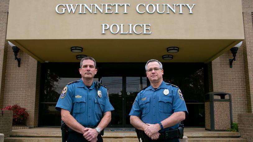 Gwinnett County Chief of Police Tom Doran and former Gwinnett County Chief of Police Butch Ayers pose outside of the Gwinnett County Police Headquarters in Lawrenceville, Georgia. Doran announced his plans to retire this week after taking the job in the fall. (Photo/Rebecca Wright for the Atlanta Journal-Constitution) AJC FILE PHOTO