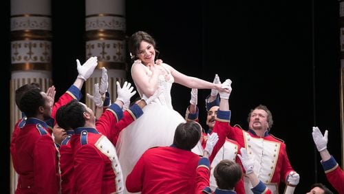 Andriana Chuchman performs with members of the Atlanta Opera chorus in “The Daughter of the Regiment.” CONTRIBUTED BY JEFF ROFFMAN
