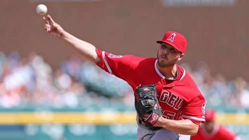 Michael Kohn #58 of the Los Angeles Angels of Anaheim pitches in the eight inning of the game against the Detroit Tigers at Comerica Park on April 20, 2014 in Detroit, Michigan. (Photo by Leon Halip/Getty Images)