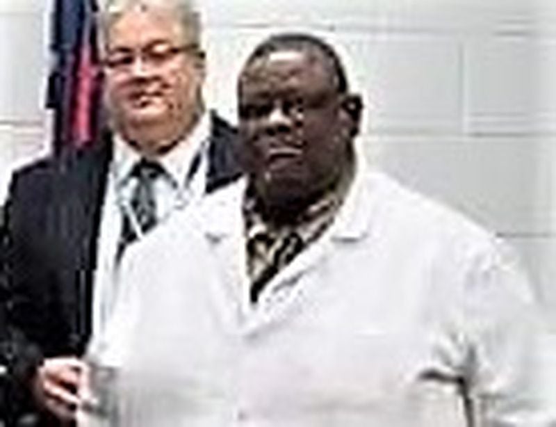Augusta State Medical Prison chief administrator Randy Brown (left) is shown with Dr. Billy Nichols, the statewide medical director for Georgia Correctional HealthCare, in this Department of Corrections photo.