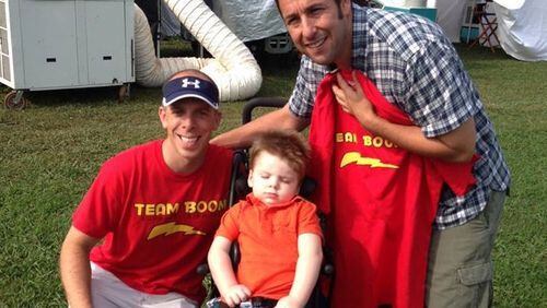 Tripp Halstead, with his dad Bill, got to visit the set of the Adam Sandler film "Blended" when it filmed in Georgia. Family photo